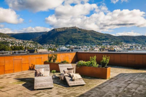 Leilighet i topp etasje med flott stor felles takterrasse